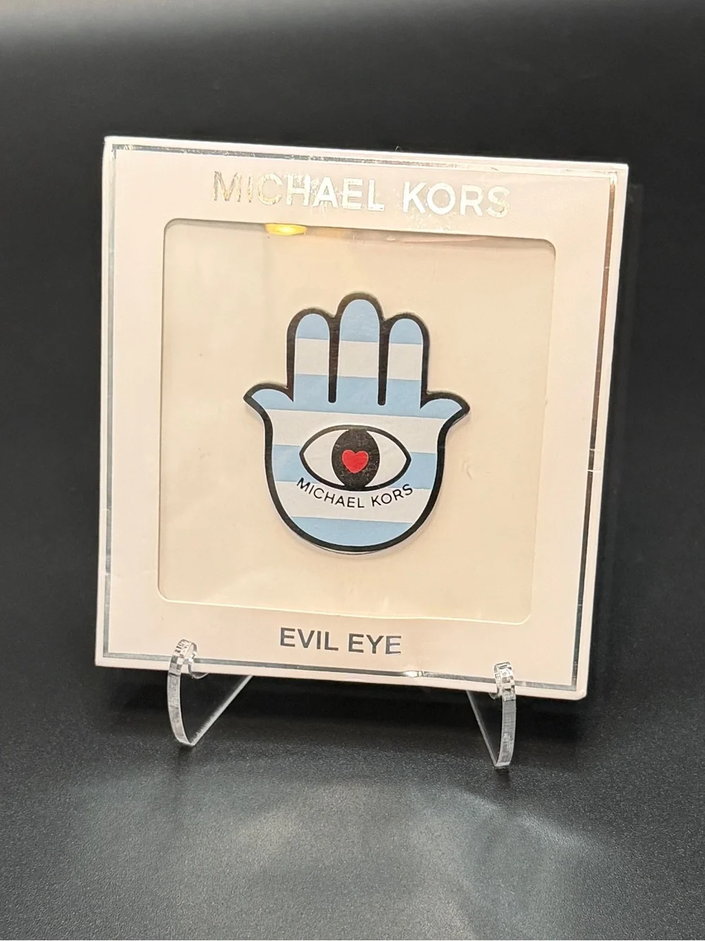 Michael Kors Light Blue Hamsa Evil Eye phone sticker.